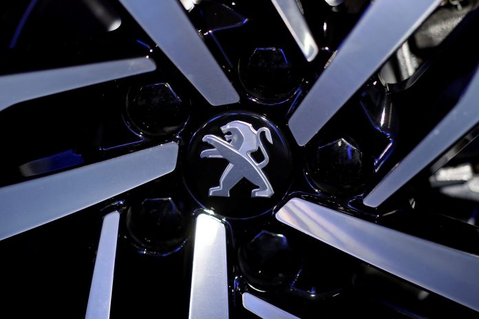 FILE PHOTO: The Peugeot logo on a Peugeot 508