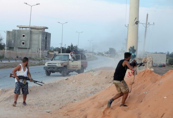 FILE PHOTO: Armed forces allied to internationally recognised government fight with armed group in Tripoli