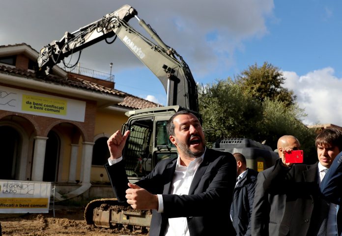 Italy's interior minister Matteo Salvini arrives to take part in the demolition of a villa built illegally by an alleged Mafia family in Rome