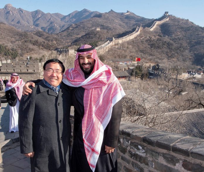 Saudi Arabia's Crown Prince Mohammed bin Salman poses for camera during his visit to Great Wall of China in Beijing
