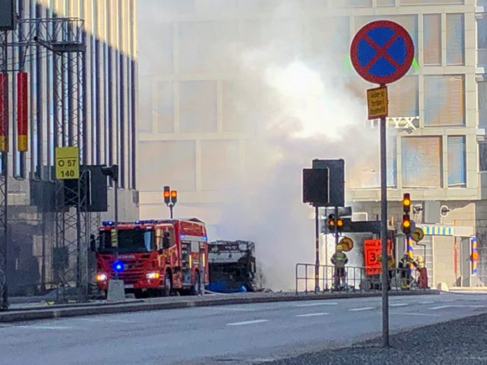 The site where a bus exploded and caught fire is seen in Tegelbacken in central Stockholm